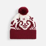Двухслойная шапка Wintertude выполнена из мягкой полушерстяной пряжи в двух гармоничных цветах. Нерегулируемый отворот на резинке обеспечивает комфортную посадку и надежную защиту от ветра. Объемный помпон и оригинальный рисунок добавляют образу игривости